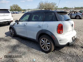 2014 MINI Countryman S with VIN WMWZC3C59EWT00838, listed as a Copart auction lot 53608055 with 114,520 mi miles and Non Repairable. Bid and sale history available at DreamBid. Image 2.