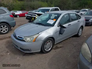 2009 Ford Focus SE with VIN 1FAHP35N49W148334, listed as a IAAI auction lot 41887678 with 73,630 mi miles. Bid and sale history available at carsss.com. Image 2.