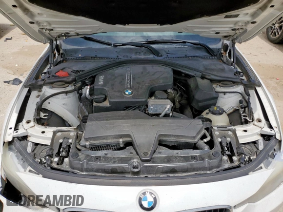 2014 BMW 3 Series 320i z VIN WBA3B1C57EP679989, wystawiony jako Copart lot #56383665 z przebiegiem 125 617 mil mil oraz Szkoda całkowita • Salvage title. Historia ofert i sprzedaży dostępna na DreamBid. Obrazek 11.