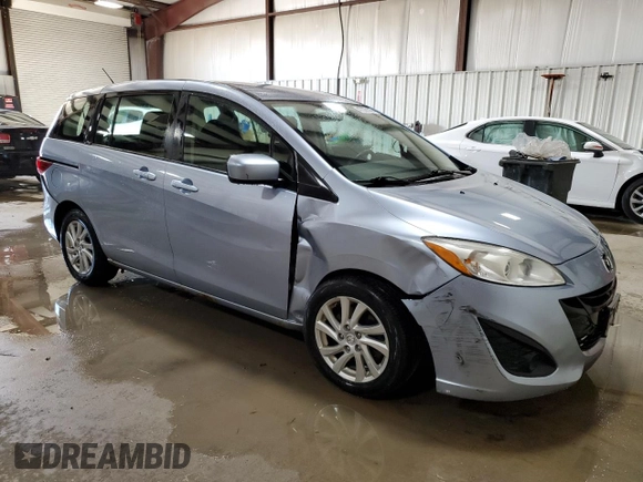 2012 Mazda 5 Sport z VIN JM1CW2BL2C0110874, wystawiony jako Copart lot #47372145 z przebiegiem 108 000 mil mil oraz Szkoda całkowita • Salvage title. Historia ofert i sprzedaży dostępna na DreamBid. Obrazek 4.