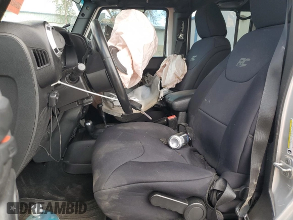 2012 Jeep Wrangler Unlimited Altitude with VIN 1C4HJWEG8CL163653, listed as a Copart auction lot 55279045 with 107,076 mi miles and Salvage title. Bid and sale history available at DreamBid. Image 7.