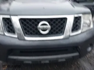 2012 Nissan Pathfinder SV with VIN 5N1AR1NBXCC611355, listed as a IAAI auction lot 41517590 with 128,870 mi miles. Bid and sale history available at carsss.com. Image 6.