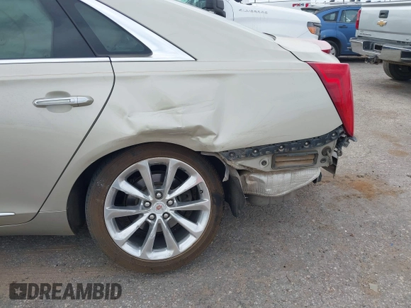 2013 Cadillac XTS Luxury with VIN 2G61P5S30D9132193, listed as a IAAI auction lot 41897709 with 140,780 mi miles and . Bid and sale history available at DreamBid. Image 6.