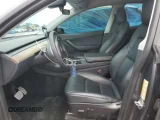 2022 Tesla Model Y Performance with VIN 7SAYGDEF4NF447462, listed as a Copart auction lot 58306595 with 61,671 mi miles and Non repairable. Bid and sale history available at DreamBid. Image 7.