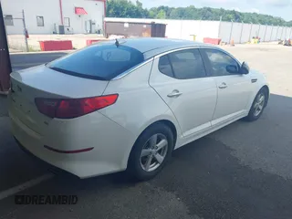 2015 Kia Optima LX with VIN KNAGM4A77F5568339, listed as a IAAI auction lot 42695740 with 135,632 mi miles and . Bid and sale history available at DreamBid. Image 4.