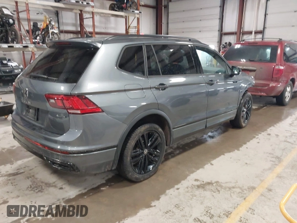 2022 Volkswagen Tiguan SE R-Line Black with VIN 3VV8B7AX9NM103988, listed as a IAAI auction lot 41908814 with 43,671 mi miles and . Bid and sale history available at DreamBid. Image 4.