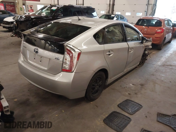 2013 Toyota Prius One z VIN JTDKN3DU5D5674730, wystawiony jako IAAI lot #40989694 z przebiegiem 159 236 mil mil oraz . Historia ofert i sprzedaży dostępna na DreamBid. Obrazek 4.