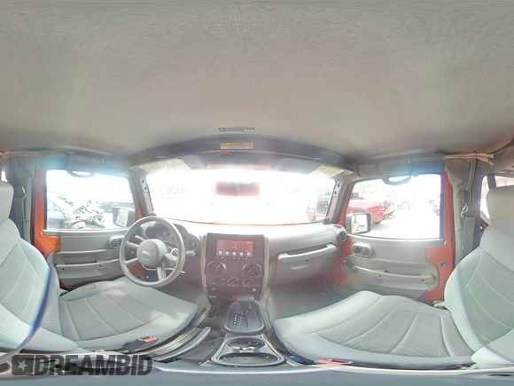 2009 Jeep Wrangler X z VIN 1J4FA24139L740959, wystawiony jako Copart lot #56509075 z przebiegiem 121 927 mil mil oraz Szkoda całkowita • Salvage title. Historia ofert i sprzedaży dostępna na DreamBid. Obrazek 14.