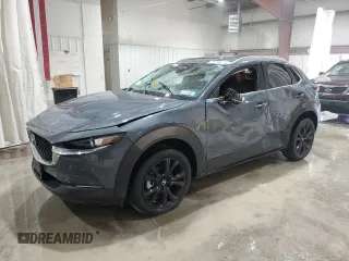 2024 Mazda CX-30 S Carbon Edition z VIN 3MVDMBCM7RM637315, wystawiony jako Copart lot #55108695 z przebiegiem 8476 mil mil oraz Szkody całkowita. Historia ofert i sprzedaży dostępna na DreamBid. Obrazek 1.