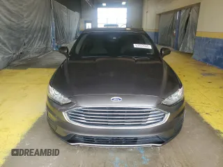 2020 Ford Fusion SE z VIN 3FA6P0HD4LR213055, wystawiony jako Copart lot #63552665 z przebiegiem 126 005 mil mil oraz Czysty tytuł • Clean title. Historia ofert i sprzedaży dostępna na DreamBid. Obrazek 5.