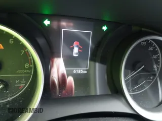 2024 Toyota Camry LE z VIN 4T1C11AK2RU879602, wystawiony jako IAAI lot #42162353 z przebiegiem 6 185 mil mil oraz . Historia ofert i sprzedaży dostępna na DreamBid. Obrazek 7.