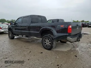 2011 Ford F-350 XL with VIN 1FT8W3BT3BEA90065, listed as a Copart auction lot 55763825 with 394,704 mi miles and Salvage title. Bid and sale history available at DreamBid. Image 2.