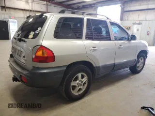 2003 Hyundai Santa Fe GLS z VIN KM8SC13DX3U431975, wystawiony jako Copart lot #56180275 z przebiegiem 239 295 mil mil oraz Czysty tytuł • Clean title. Historia ofert i sprzedaży dostępna na DreamBid. Obrazek 3.
