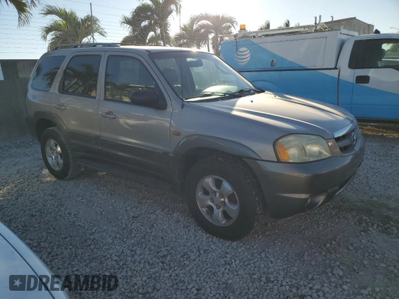 2002 Mazda Tribute LX with VIN 4F2YU091X2KM22268, listed as a Copart auction lot 82915484 with 70,684 mi miles and Clean Title. Bid and sale history available at carsss.com. Image 4.