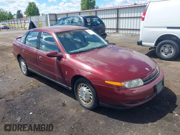 2002 Saturn LS z VIN 1G8JS54F32Y553105, wystawiony jako IAAI lot #42237383 z przebiegiem 107 385 mil mil oraz . Historia ofert i sprzedaży dostępna na DreamBid. Obrazek 1.