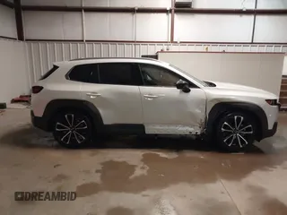 2023 Mazda CX-50 S Premium Plus with VIN 7MMVABEMXPN139186, listed as a IAAI auction lot 41289690 with 26,556 mi miles and . Bid and sale history available at DreamBid. Image 13.