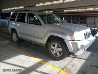 2007 Jeep Grand Cherokee Laredo with VIN 1J8GR48K67C652382, listed as a Copart auction lot 45310295 with 266,618 mi miles and Salvage Title. Bid and sale history available at carsss.com. Image 4.