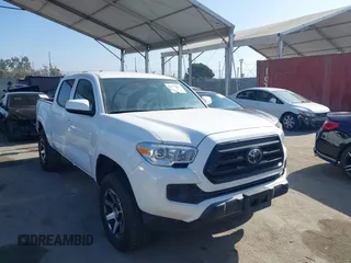 2023 Toyota Tacoma SR with VIN 3TMCZ5AN5PM594103, listed as a IAAI auction lot 42675803 with 21,759 mi miles and . Bid and sale history available at DreamBid. Image 1.
