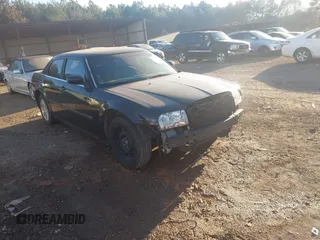 2005 Chrysler 300 with VIN 2C3JA43R25H663905, listed as a IAAI auction lot 41592902 with 140,459 mi miles. Bid and sale history available at carsss.com. Image 1.