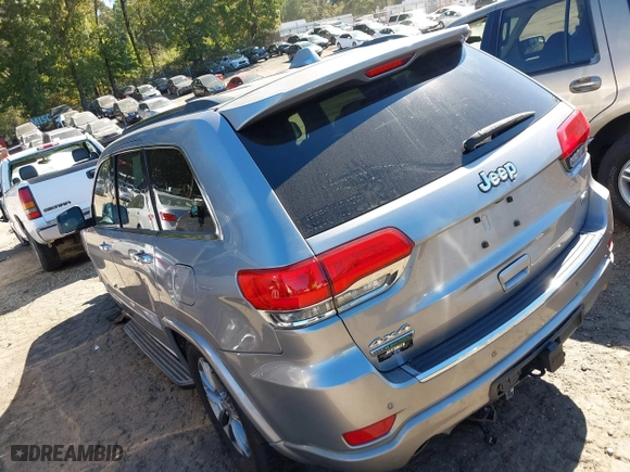2014 Jeep Grand Cherokee Overland with VIN 1C4RJFCM4EC316142, listed as a IAAI auction lot 40607061 with 195,008 mi miles. Bid and sale history available at carsss.com. Image 3.