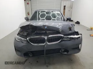 2019 BMW 3 Series 330i with VIN WBA5R1C56KFH04731, listed as a Copart auction lot 56854405 with 99,999 mi miles and Clean title. Bid and sale history available at DreamBid. Image 5.