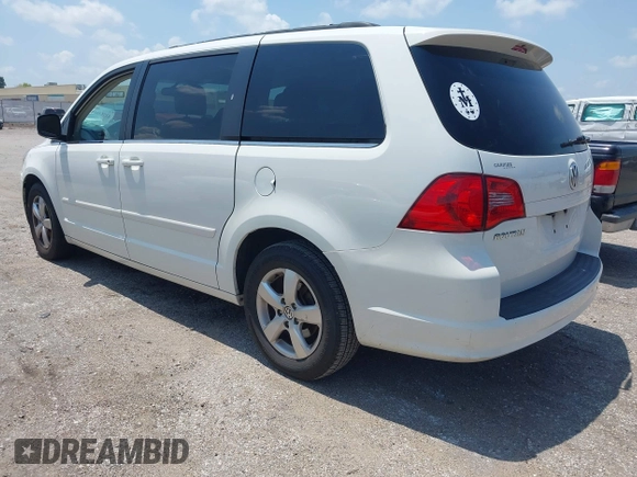 2011 Volkswagen Routan SE with VIN 2V4RW3DG3BR641964, listed as a IAAI auction lot 42758818 with 119,247 mi miles and . Bid and sale history available at DreamBid. Image 3.