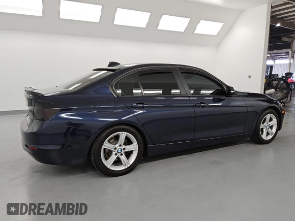 2013 BMW 3 Series 328i with VIN WBA3A5C50DF603562, listed as a Copart auction lot 58589135 with 112,150 mi miles and Salvage title. Bid and sale history available at DreamBid. Image 3.