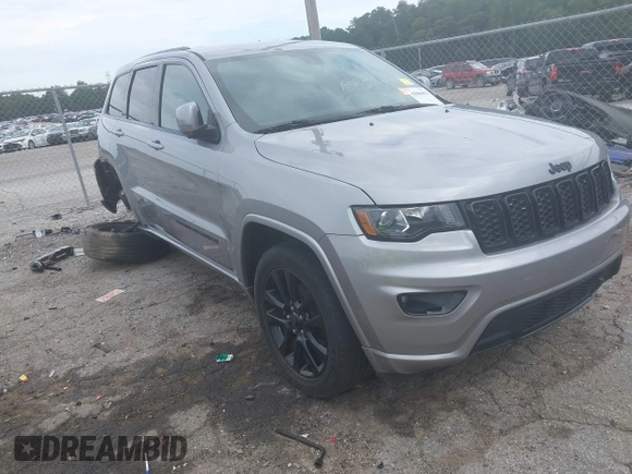 2018 Jeep Grand Cherokee Laredo E z VIN 1C4RJEAG5JC404022, wystawiony jako IAAI lot #42586412 z przebiegiem 95 798 mil mil oraz . Historia ofert i sprzedaży dostępna na DreamBid. Obrazek 1.