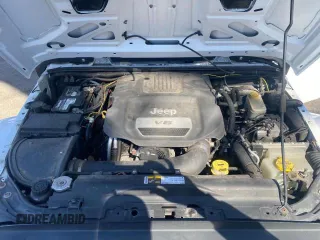 2014 Jeep Wrangler Unlimited Sahara with VIN 1C4BJWEG1EL272951, listed as a Copart auction lot 52157145 with 56,989 mi miles and Clean Title. Bid and sale history available at carsss.com. Image 7.