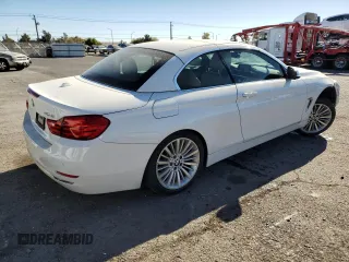 2014 BMW 4 Series 428i with VIN WBA3V7C52EJ872614, listed as a Copart auction lot 87760865 with Not provided miles and Salvage title. Bid and sale history available at DreamBid. Image 3.