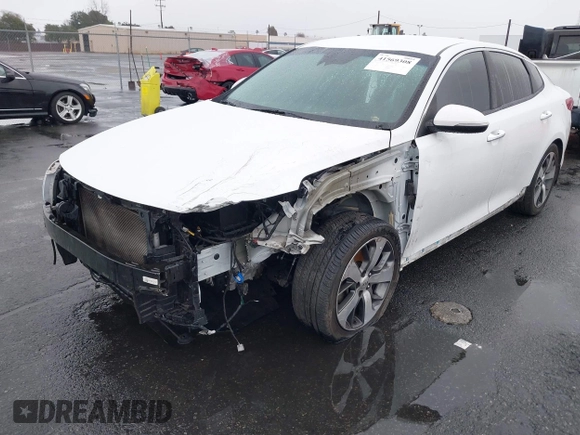 2020 Kia Optima LX with VIN 5XXGT4L32LG426259, listed as a IAAI auction lot 41569308 with 114,656 mi miles. Bid and sale history available at carsss.com. Image 2.