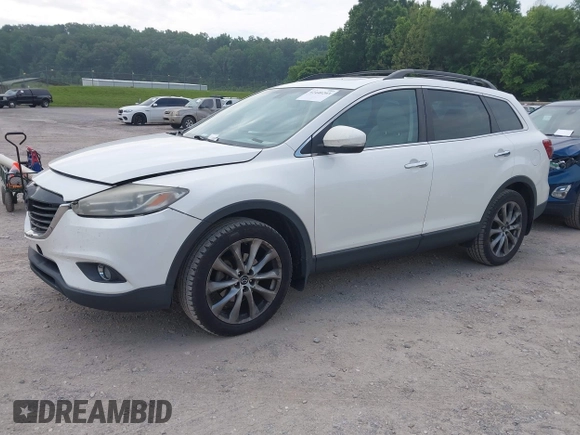 2015 Mazda CX-9 Grand Touring with VIN JM3TB2DA7F0448886, listed as a IAAI auction lot 42440203 with 108,765 mi miles and . Bid and sale history available at DreamBid. Image 2.