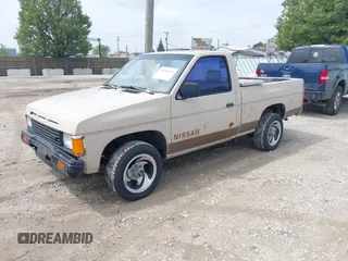 1986 Nissan Hardbody E with VIN JN6ND11S0GW000696, listed as a IAAI auction lot 42358321 with 445,199 mi miles and . Bid and sale history available at DreamBid. Image 2.
