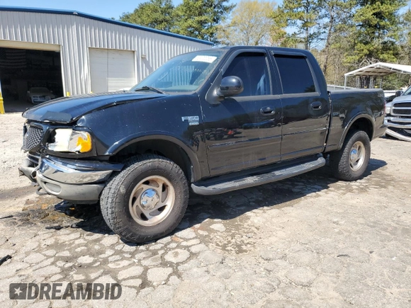 2003 Ford F-150 XLT with VIN 1FTRW08L63KB47470, listed as a Copart auction lot 50400055 with 223,859 mi miles and Salvage Title. Bid and sale history available at carsss.com. Image 1.