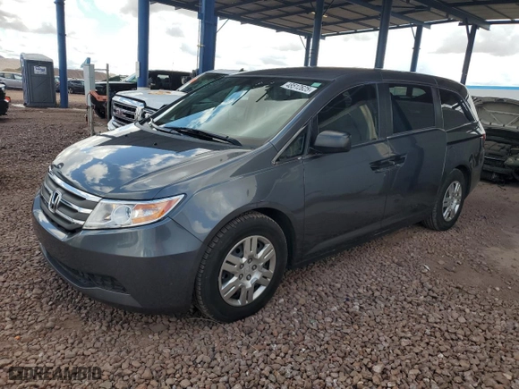 2012 Honda Odyssey LX with VIN 5FNRL5H21CB013296, listed as a Copart auction lot 48512625 with 69,381 mi miles and Salvage Title. Bid and sale history available at carsss.com. Image 1.