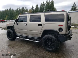 2003 Hummer H2 with VIN 5GRGN23U73H111109, listed as a Copart auction lot 76388144 with 160,179 mi miles and Salvage Title. Bid and sale history available at carsss.com. Image 2.