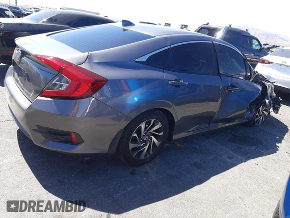 2018 Honda Civic EX с VIN 19XFC2F79JE040927, выставлен на аукционе Copart как лот 55696165 с пробегом 58 696 миль миль и Списание • Salvage title. История ставок и продаж доступна на DreamBid. Изображение 3.