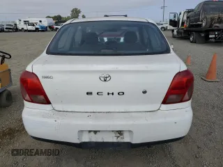 2002 Toyota ECHO with VIN JTDAT123720247382, listed as a Copart auction lot 66388584 with 233,892 mi miles and Salvage title. Bid and sale history available at DreamBid. Image 6.