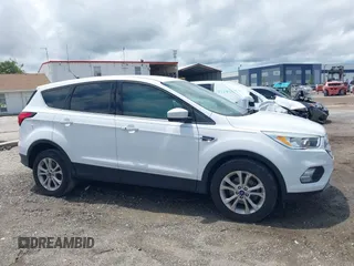 2019 Ford Escape SE z VIN 1FMCU0GD1KUA12322, wystawiony jako IAAI lot #42232033 z przebiegiem 141 764 mil mil oraz . Historia ofert i sprzedaży dostępna na DreamBid. Obrazek 13.