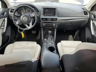 2016 Mazda CX-5 Grand Touring with VIN JM3KE4DY4G0750939, listed as a Copart auction lot 52727395 with 72,428 mi miles and Salvage Title. Bid and sale history available at carsss.com. Image 8.