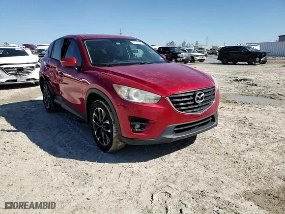 2016 Mazda CX-5 Grand Touring with VIN JM3KE2DY3G0785556, listed as a Copart auction lot 47703395 with 153,349 mi miles and Salvage Title. Bid and sale history available at carsss.com. Image 12.