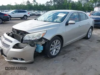 2013 Chevrolet Malibu LTZ with VIN 1G11H5SA5DF259174, listed as a IAAI auction lot 42145891 with 158,959 mi miles and . Bid and sale history available at DreamBid. Image 2.