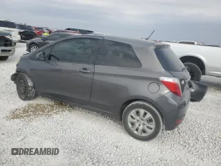 2013 Toyota Yaris L z VIN JTDJTUD33DD571231, wystawiony jako Copart lot #75826024 z przebiegiem 224 036 mil mil oraz Szkoda całkowita • Salvage title. Historia ofert i sprzedaży dostępna na DreamBid. Obrazek 2.