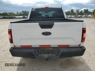 2019 Ford F-150 XL with VIN 1FTEW1CBXKKF14856, listed as a Copart auction lot 71306444 with 100,057 mi miles and Salvage title. Bid and sale history available at DreamBid. Image 6.