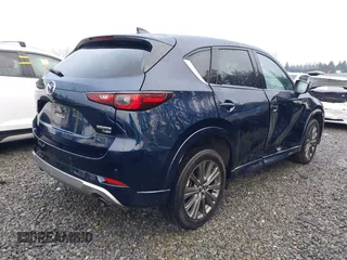 2024 Mazda CX-5 2.5 Turbo Signature with VIN JM3KFBXY6R0421448, listed as a IAAI auction lot 41344699 with 18,738 mi miles. Bid and sale history available at carsss.com. Image 4.