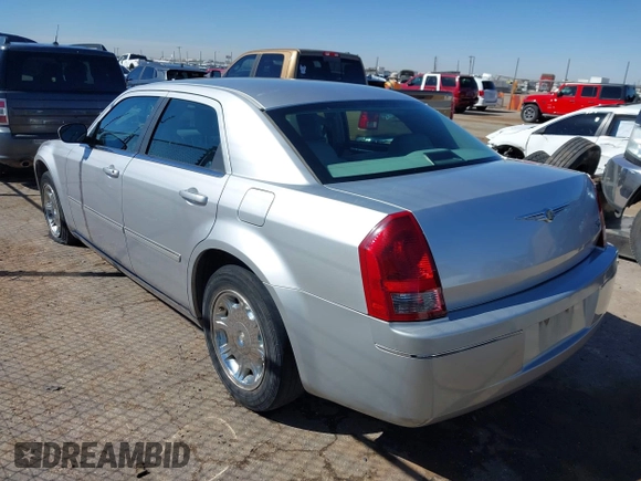 2006 Chrysler 300 Touring with VIN 2C3KA53G86H111027, listed as a IAAI auction lot 41870312 with 59,870 mi miles. Bid and sale history available at carsss.com. Image 3.