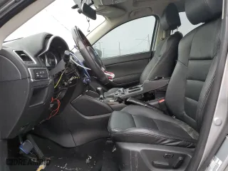 2016 Mazda CX-5 Grand Touring with VIN JM3KE2DY0G0852291, listed as a Copart auction lot 50665275 with 103,162 mi miles and Salvage Title. Bid and sale history available at carsss.com. Image 7.