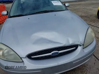 2003 Ford Taurus SES Standard z VIN 1FAFP55S43G270637, wystawiony jako IAAI lot #42205556 z przebiegiem 171 286 mil mil oraz . Historia ofert i sprzedaży dostępna na DreamBid. Obrazek 18.