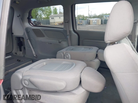 2012 Kia Sedona LX with VIN KNDMG4C76C6453523, listed as a IAAI auction lot 42189376 with 207,557 mi miles. Bid and sale history available at carsss.com. Image 8.