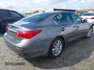 2015 Infiniti Q50 with VIN JN1BV7AP2FM332816, listed as a IAAI auction lot 41864532 with 180,683 mi miles. Bid and sale history available at carsss.com. Image 4.